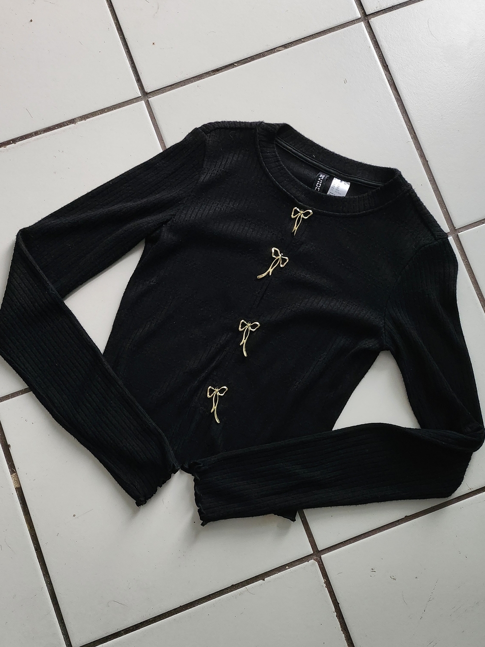 H&M Black Ribbed Long Sleeve Top with Gold Bow Accents